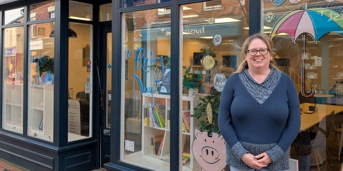 Elizabeth Elizabeth standing outside the Ascentant office in Ripley smiling at the camera