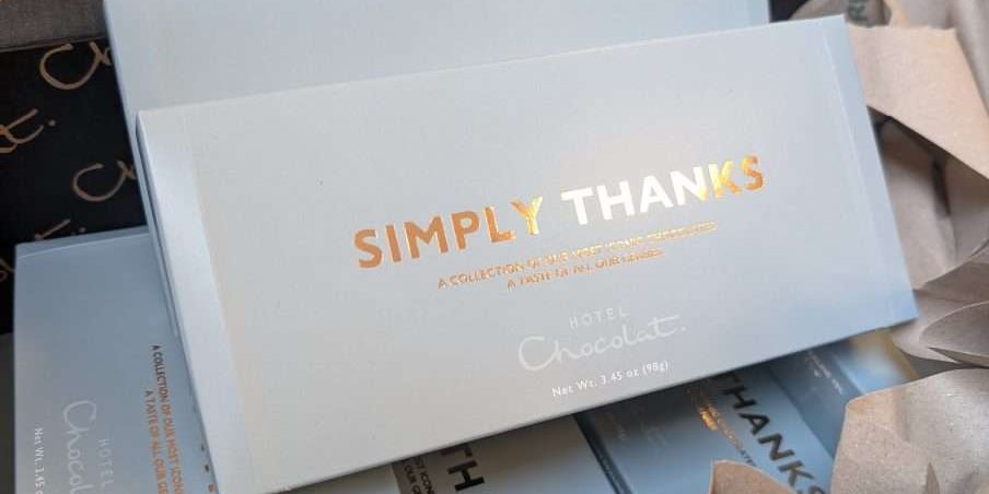 PXL_20260302_130540718 Image shows boxes of Hotel Chocolat chocolates which say 'Simply Thanks' on the lid.